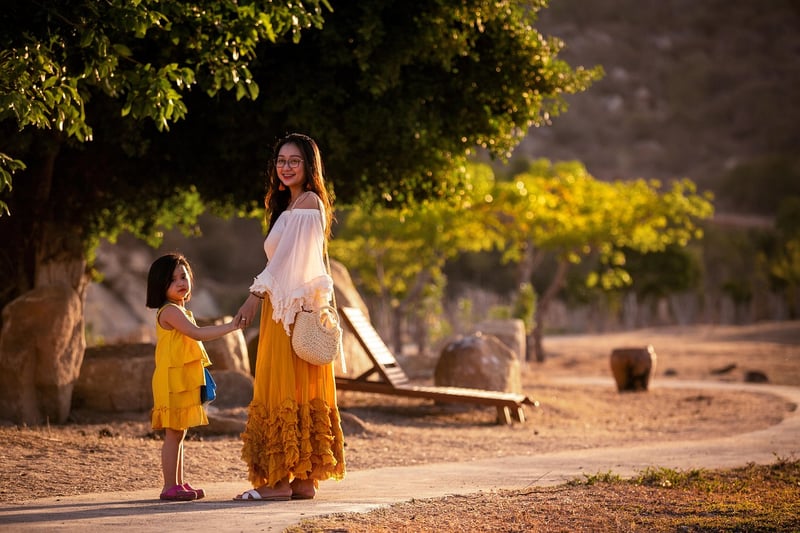 Kids gardening with mother